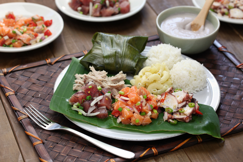  Traditional Hawaiian plate lunch with ahi poke, lomi lomi salmon, kalua pork, and poi